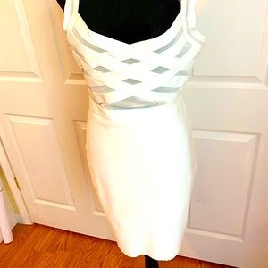 Get ready for the white party with this Akra dress!